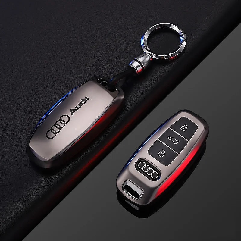Audi keychain and key fob on a dark background