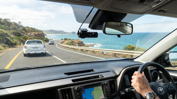 Dashboard view of a premium 4K dash cam mounted on windshield with clear footage of Australian road