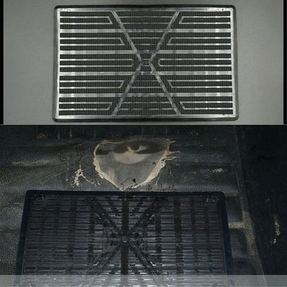Metal drain cover with a heart-shaped hole on a dark background