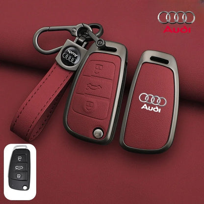 Audi car key fob with red leather strap on a red background