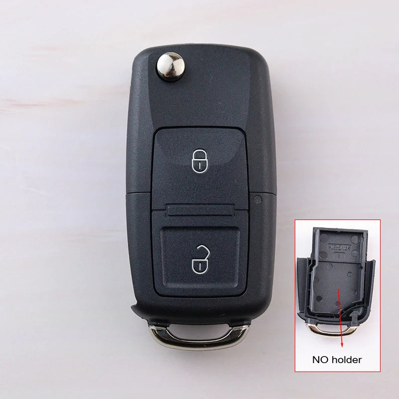 Black car key fob with two buttons on a white background, inset showing no holder.