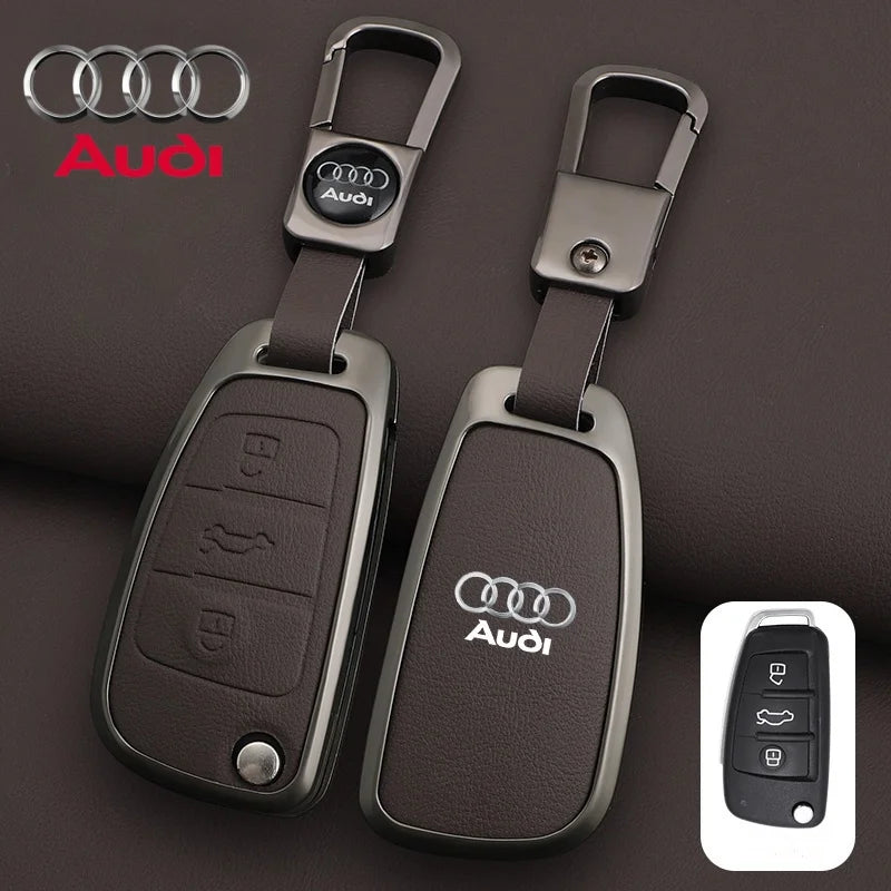 Audi car key fobs with remote on a dark background