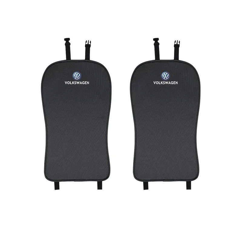 Two black Volkswagen car seat covers on a white background