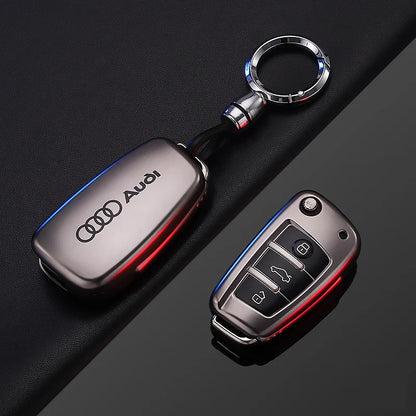 Audi keychain and car key fob on a dark background