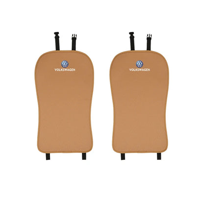 Two brown Volkswagen car seat covers on a white background