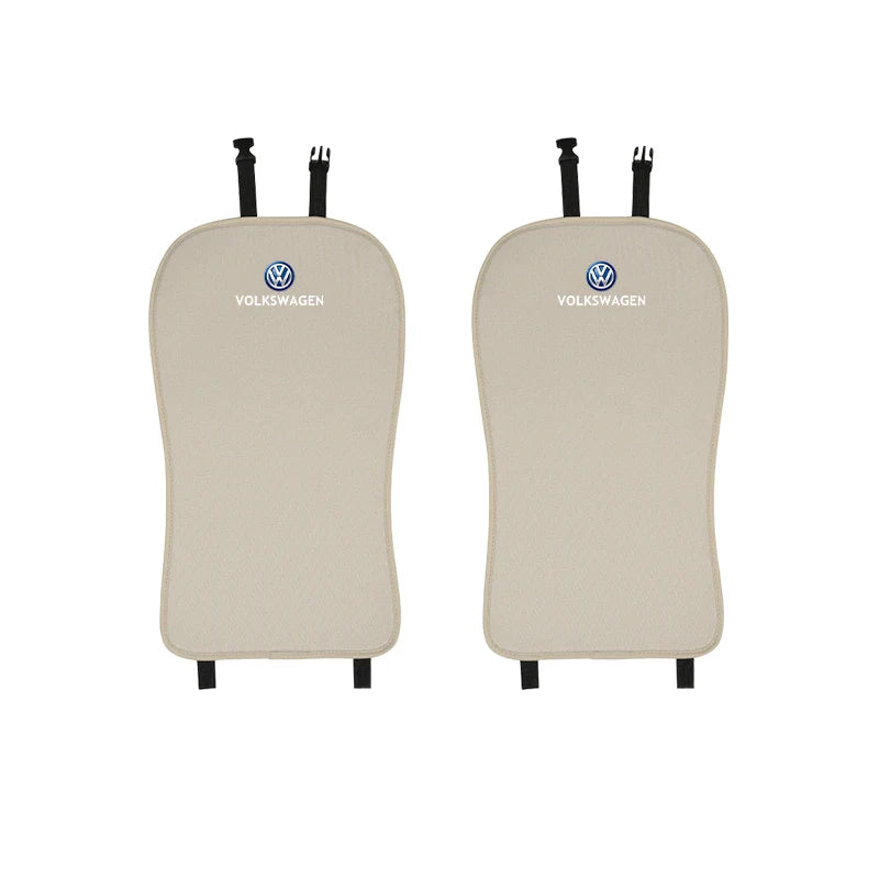 Two beige Volkswagen car seat covers on a white background