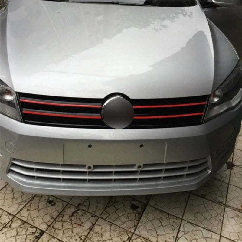 Car front with a black and red stripe design on a cracked pavement background