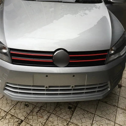 Car front with a black and red stripe design on a cracked pavement background