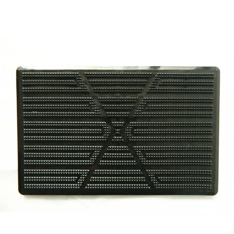 Black textured rectangular object on a white background