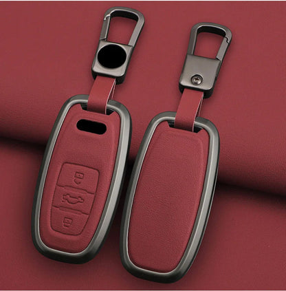 Red car key fob cover with metallic accents on a red background