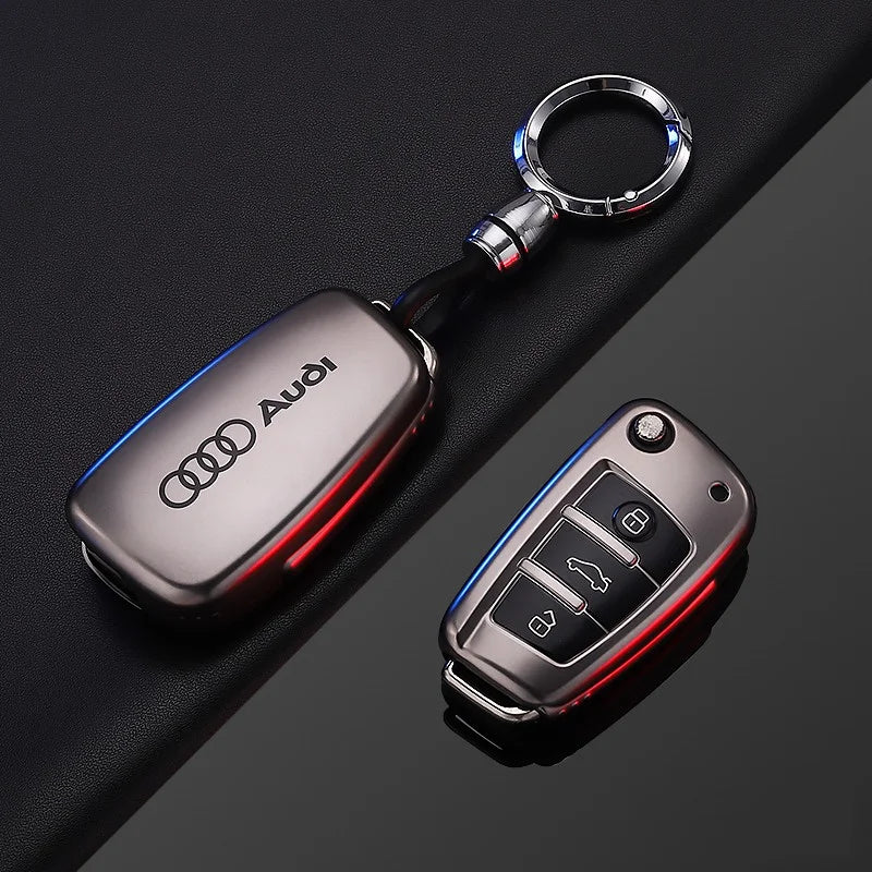 Audi keychain and car key fob on a dark background